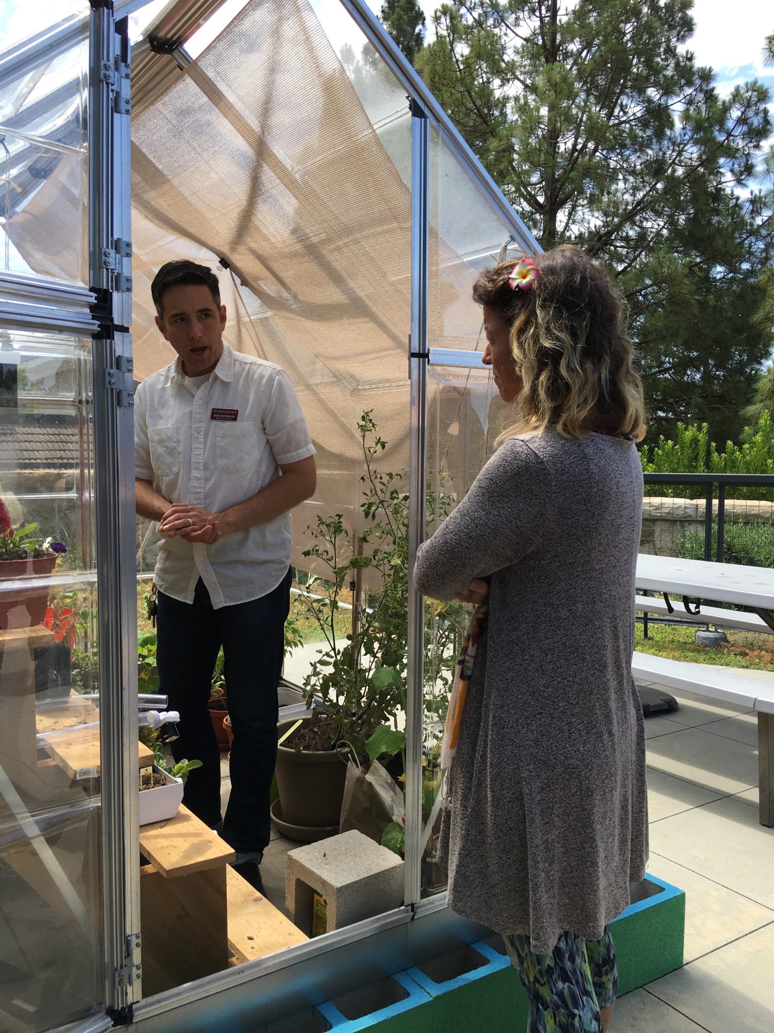 Westmont Professor, Donald J. Patterson and Cal State Long Beach professor, Birgit Penzenstadler look at the smart greenhouse